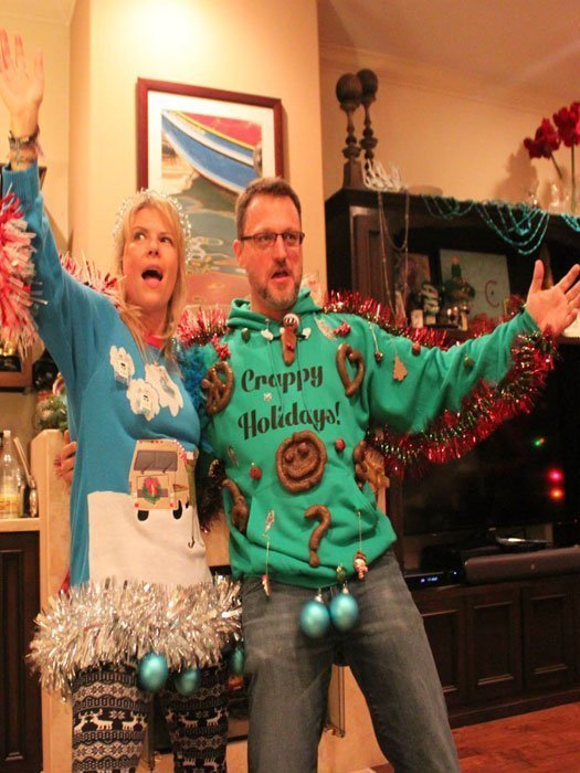 Steve Blum and Mary Elizabeth McGlynn in ugly Christmas sweaters