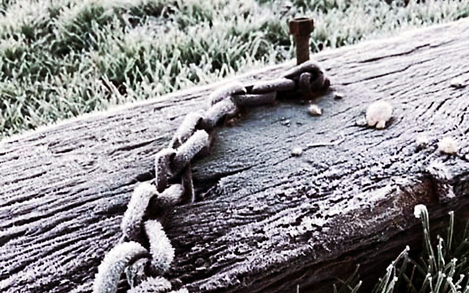 Chain nailed to a timber