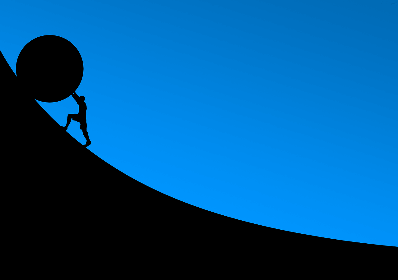 Tenacity- Blue background, silhouetted image of person pushing boulder up a hill